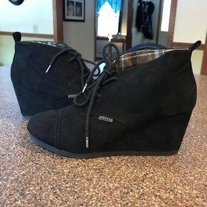 Black wedge booties
